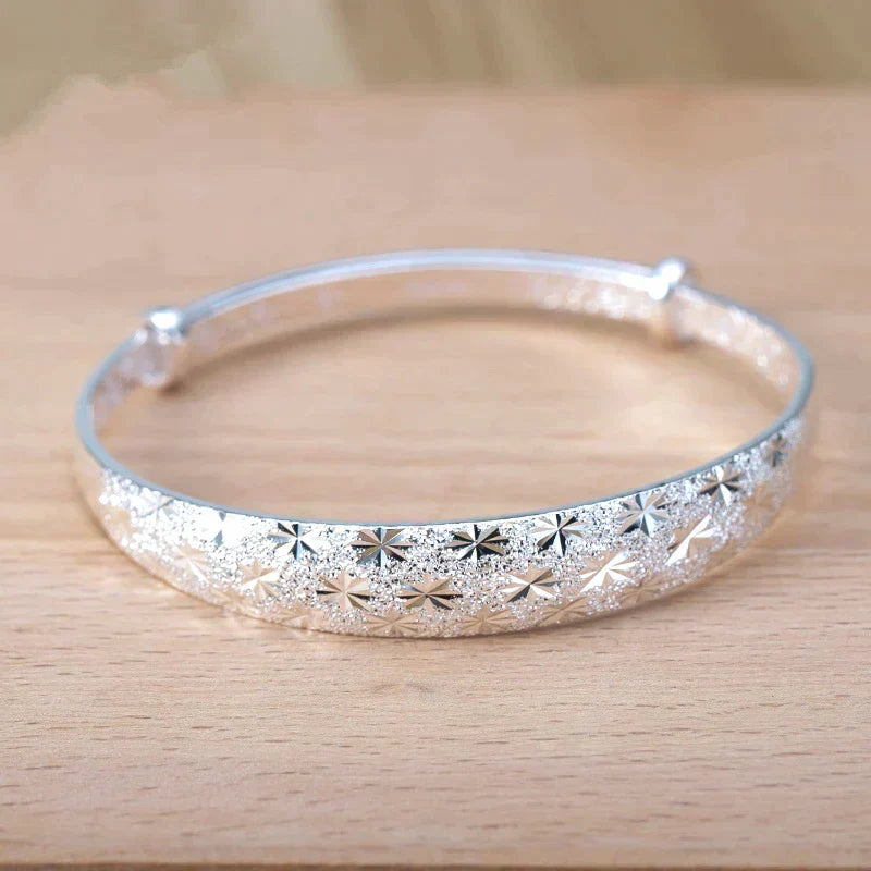 Enchanting Star-Shaped Silver Bracelet for a Radiant Look Bowlift