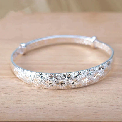 Enchanting Star-Shaped Silver Bracelet for a Radiant Look Bowlift