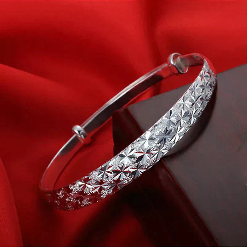 Enchanting Star-Shaped Silver Bracelet for a Radiant Look Bowlift