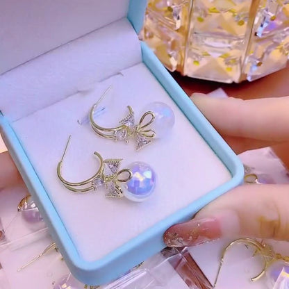 Skanto | Bow Pearl Earrings