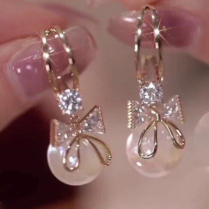 Skanto | Bow Pearl Earrings
