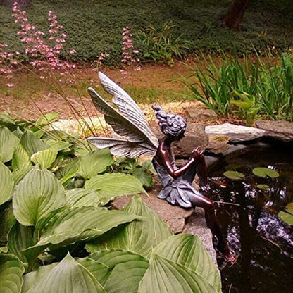 Kalsten | Statue of sitting fairy in the garden