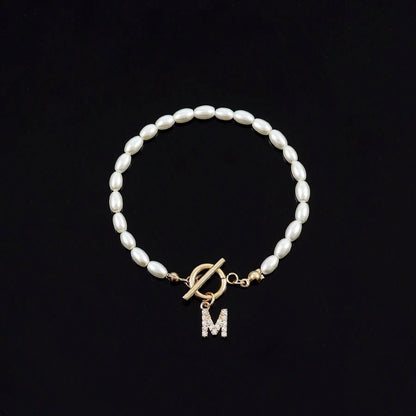 Karnz | Classic Pearl Clasp Letter Initial Bracelets