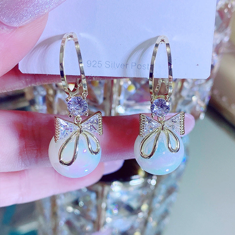 Skanto | Bow Pearl Earrings