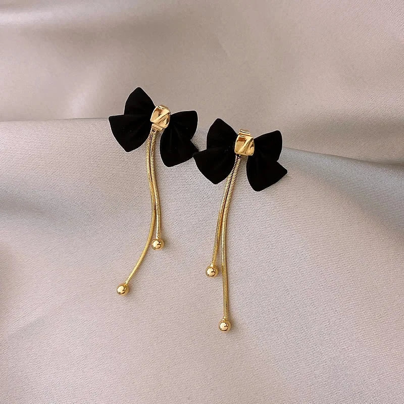 BowLift | Dainty Bow Gold Dangle Earrings