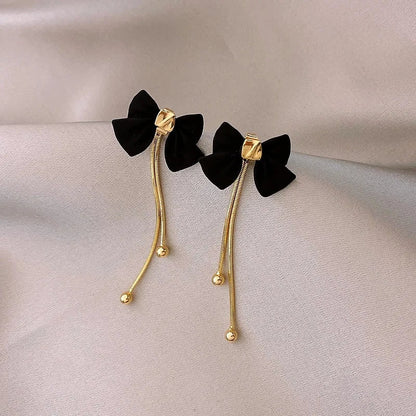 BowLift | Dainty Bow Gold Dangle Earrings