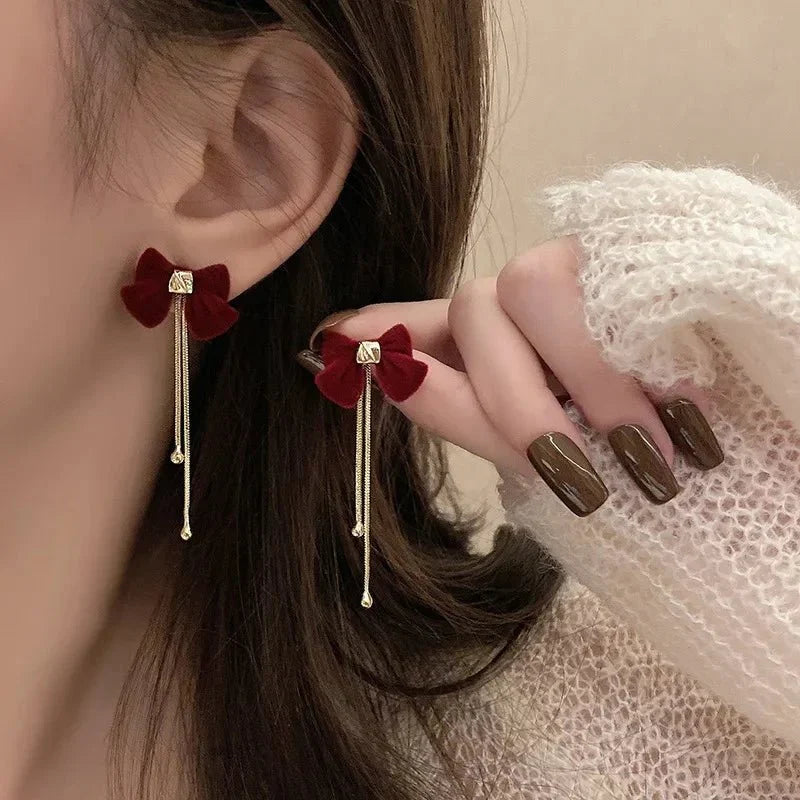 BowLift | Dainty Bow Gold Dangle Earrings