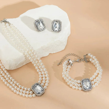 Skanto | Elegant Pearl Diamond Jewelry, Bracelet and Earring Set