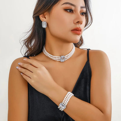 Skanto | Elegant Pearl Diamond Jewelry, Bracelet and Earring Set