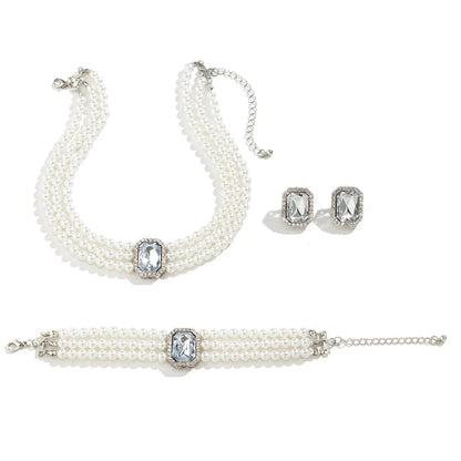 Skanto | Elegant Pearl Diamond Jewelry, Bracelet and Earring Set