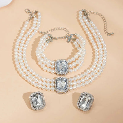 Skanto | Elegant Pearl Diamond Jewelry, Bracelet and Earring Set