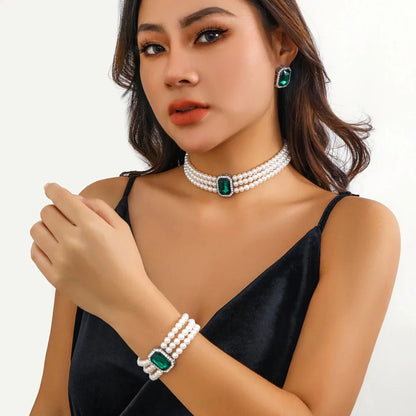 Skanto | Elegant Pearl Diamond Jewelry, Bracelet and Earring Set