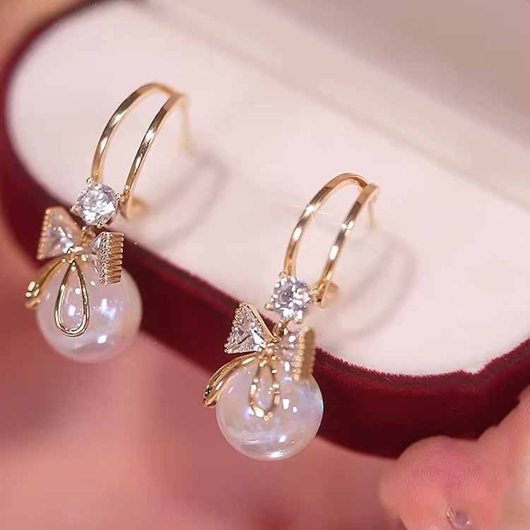 Skanto | Bow Pearl Earrings