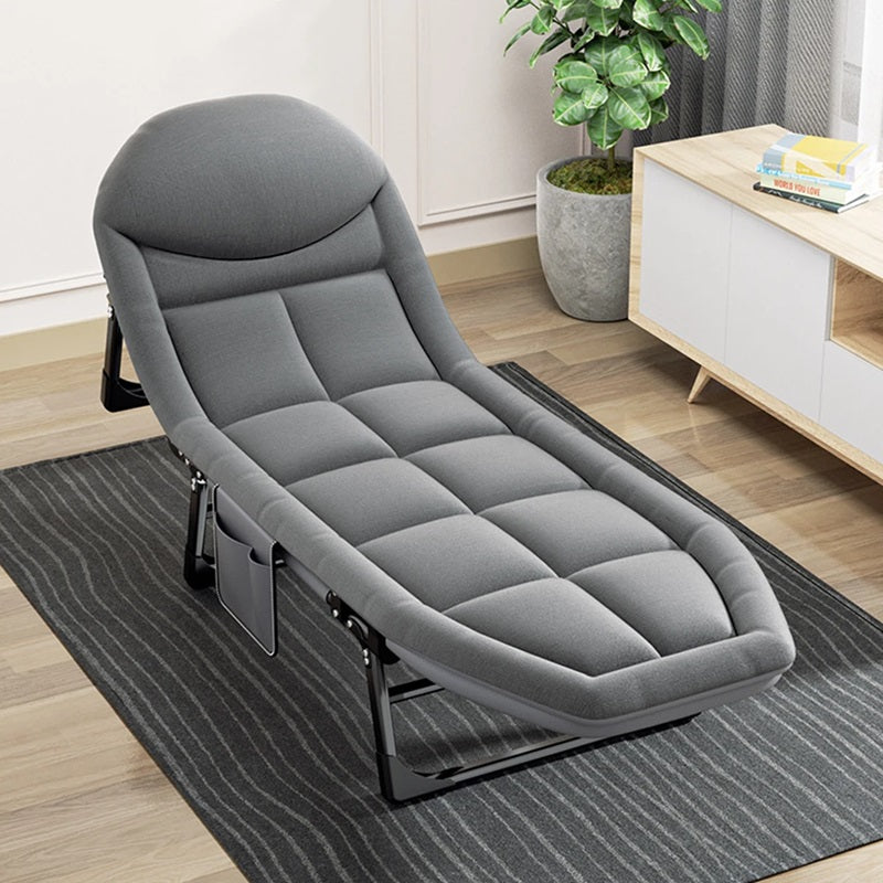 Folding Bed with Integrated Pillow and Side Pocket