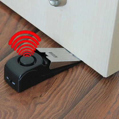 Portable wireless alarm door stopper | Brehn
