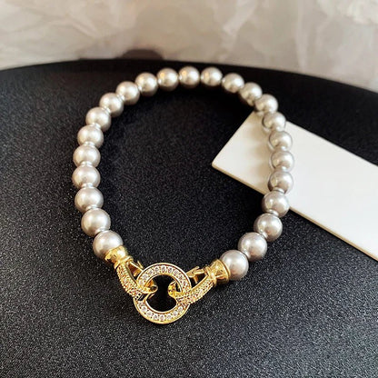 Skanto | Pearl Diamond Accented Circular Pendant Bracelet and Necklace