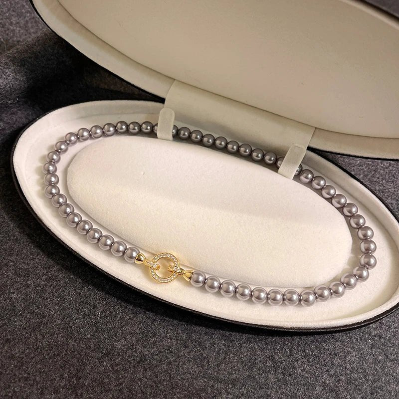 Skanto | Pearl Diamond Accented Circular Pendant Bracelet and Necklace