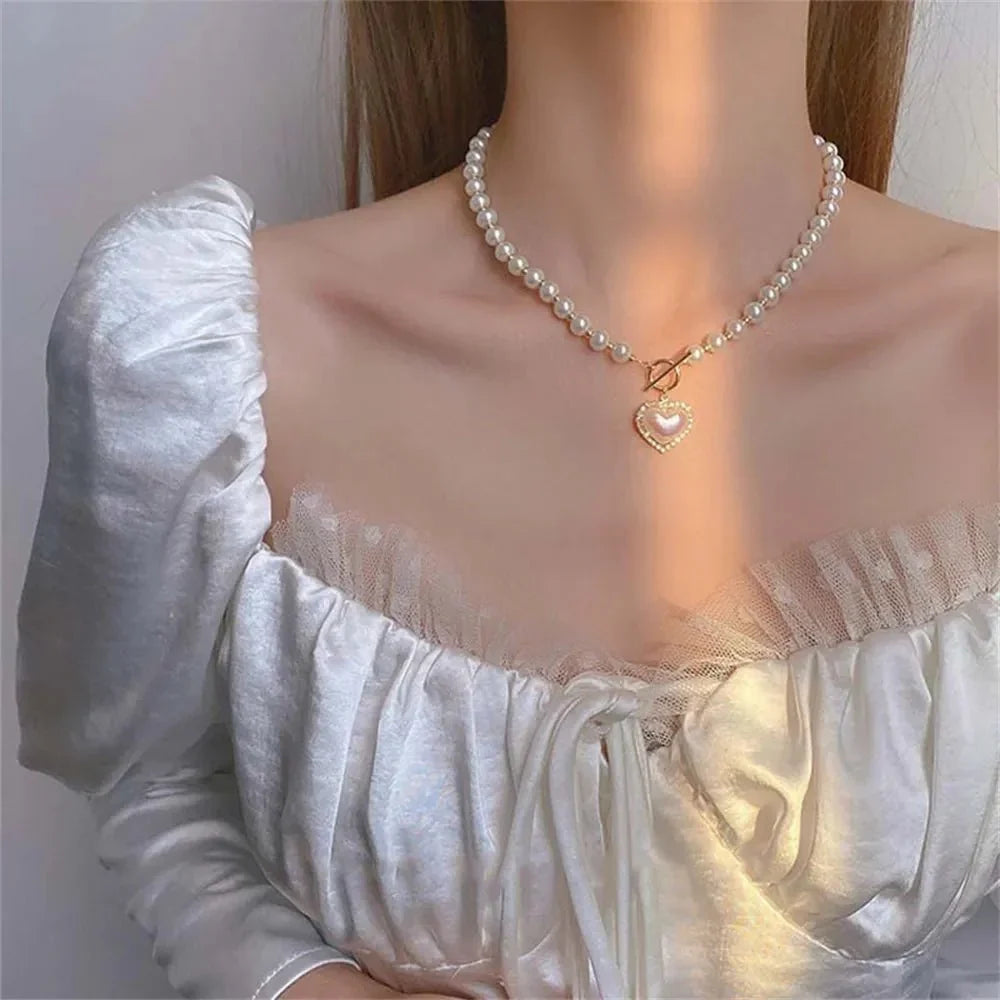 Skanto | Pearl Heart Clasp Choker Necklace