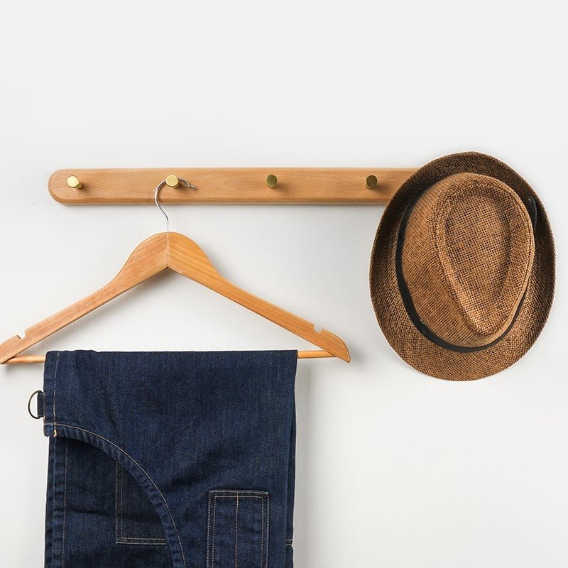 BowLift | WandHout – Minimalistic wooden wall coat rack with brass hooks
