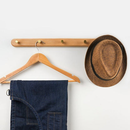 BowLift | WandHout – Minimalistic wooden wall coat rack with brass hooks