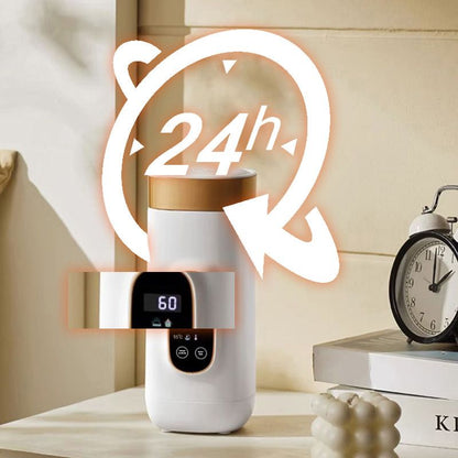 Travel mug with electric heating system