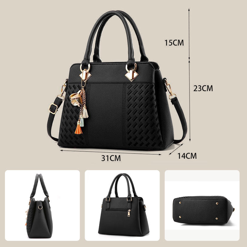 Elegant women's handbag with tassel charm