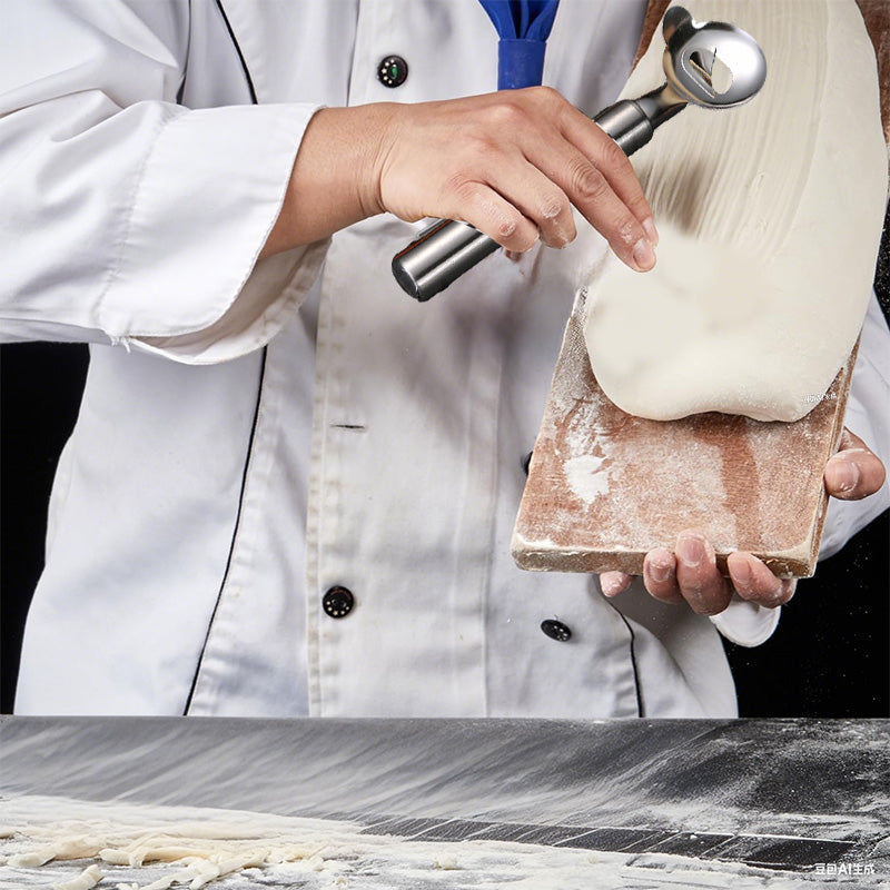 BowLift | Stainless steel noodle knife with slotted design