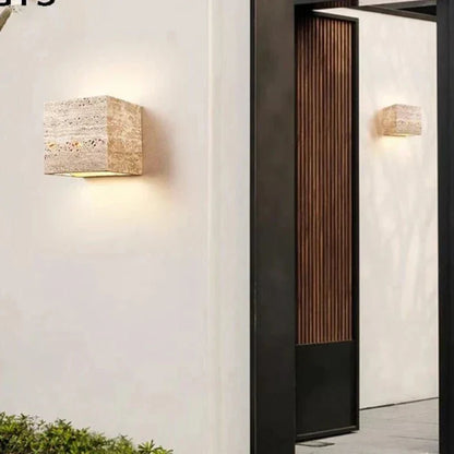 BowLift | Wall lamp made of travertine for a warm and elegant atmosphere