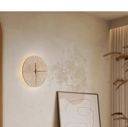 Bring your space to life with the Wabi-Sabi travertine wall clock.