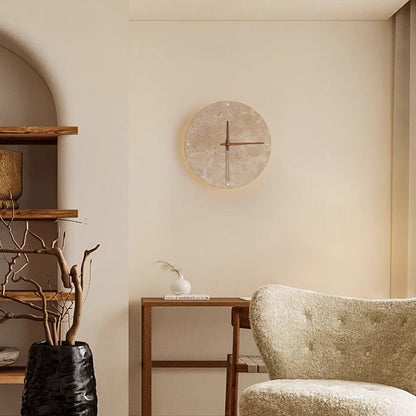 Bring your space to life with the Wabi-Sabi travertine wall clock.