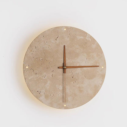 Bring your space to life with the Wabi-Sabi travertine wall clock.