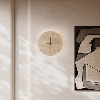 Bring your space to life with the Wabi-Sabi travertine wall clock.