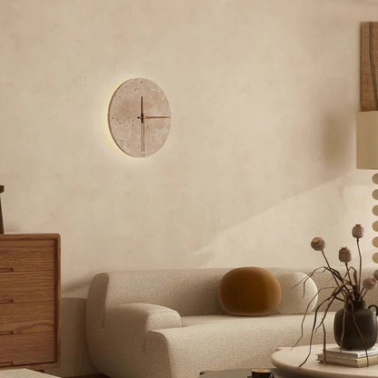 Bring your space to life with the Wabi-Sabi travertine wall clock.