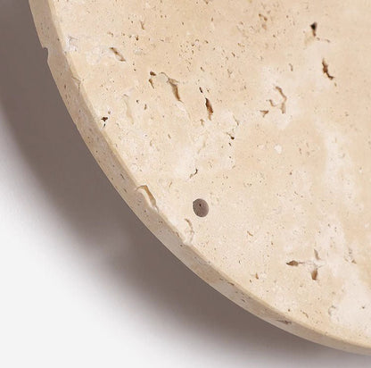 Bring your space to life with the Wabi-Sabi travertine wall clock.